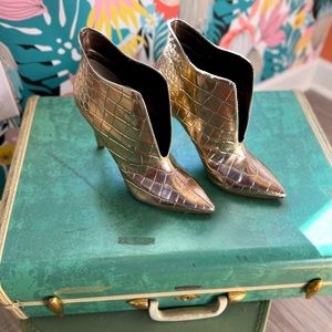 Nine West; Tila Dazzling gold faux embossed crocodile bootie stiletto